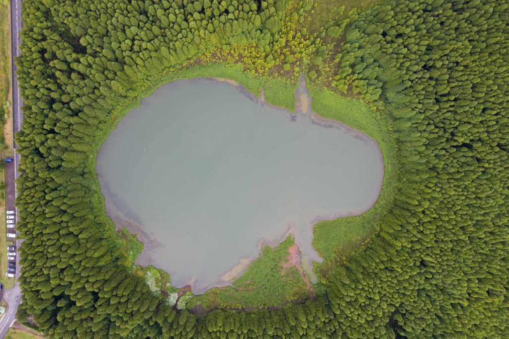Aerial view of forest and lake in Miguel, The Azores. A day on San Miguel