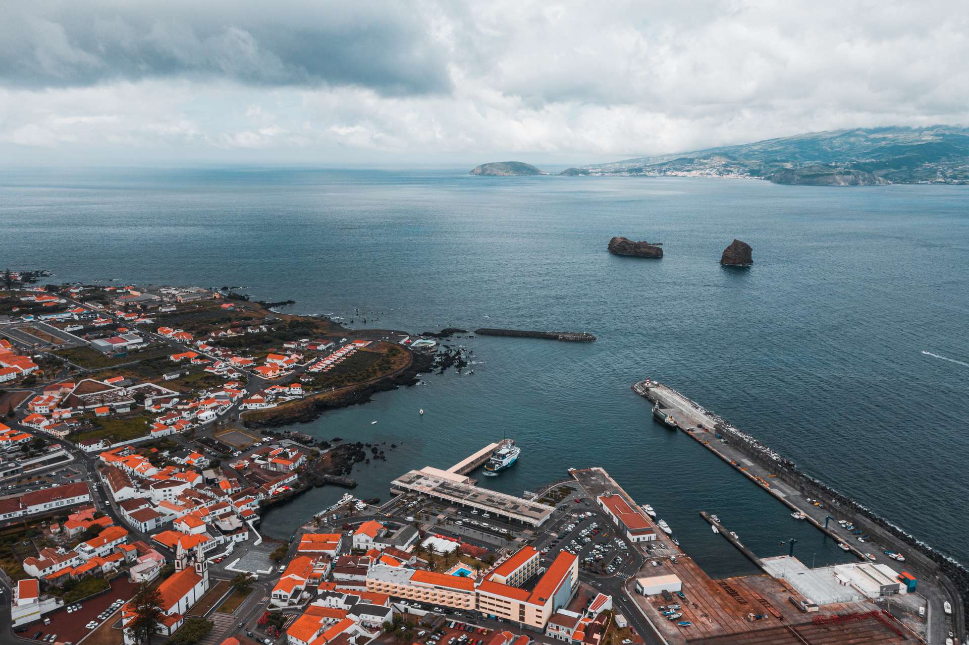 Aerial view of houses, buildings and the sea in Pico, The Azores. Pico views and trouble parking at the whaling museum