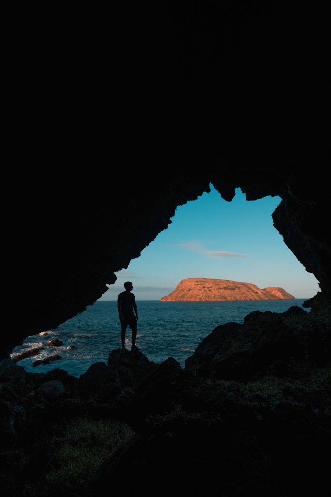 David Simpson at the entrance of a cave by the bay in Terceira Island, The Azores. Terceira, another photographer’s dream