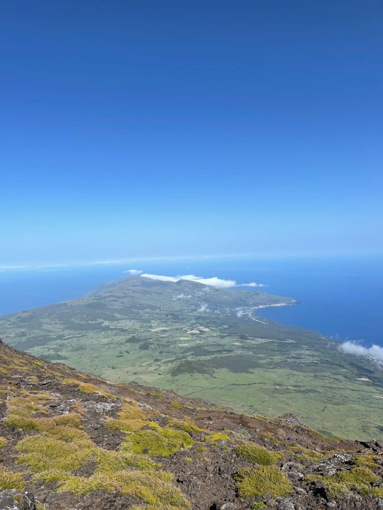 View of the sea from the top of the mountain in Pico, The Azores. Camping in volcano Pico, Portugal’s highest mountain