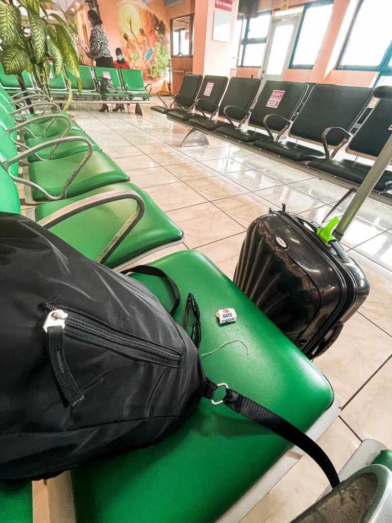 Bags and airport seats in Dominica. The most stressful travel day ever!