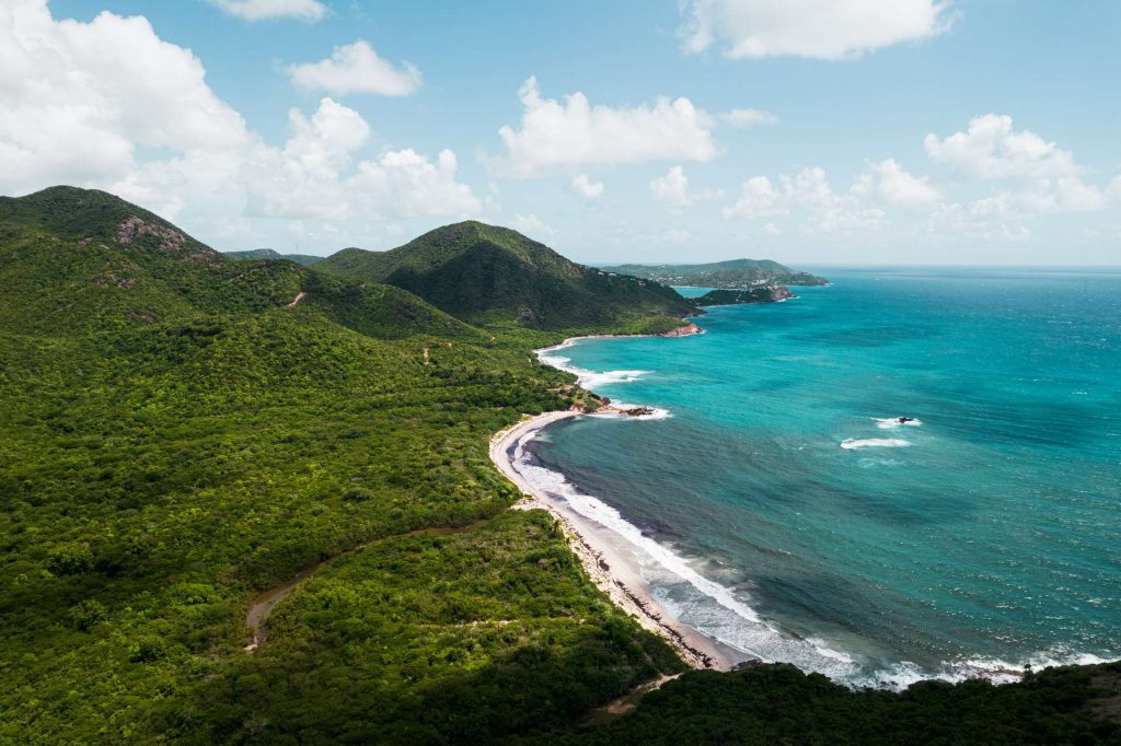 Aerial view of beach and the sea in Antigua. Rendezvous beach and cliffside accom in BVI