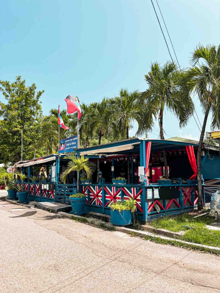 Colorful roadside bar and grill in Antigua. Sir Vivian Richards & don’t hike in flip flops