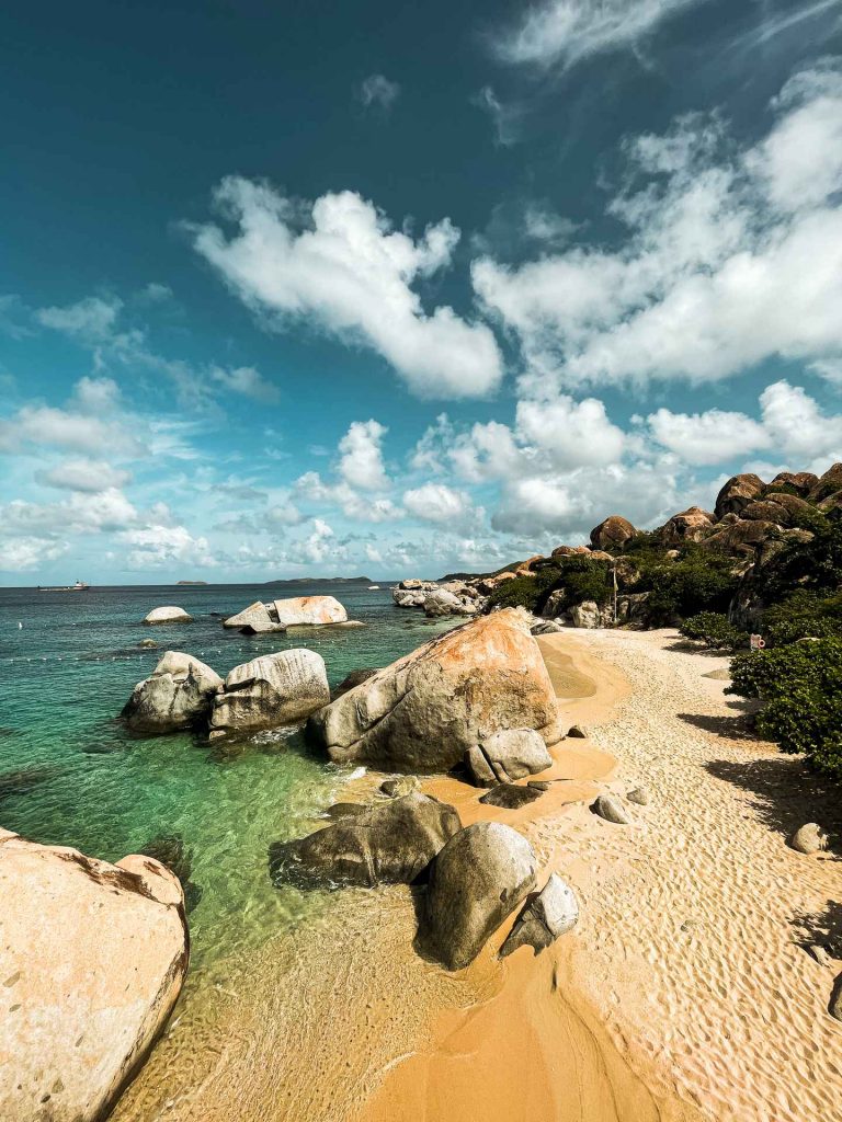 Boulders by the beach on a sunny day in British Virgin Islands. The baths at Virgin Gorda