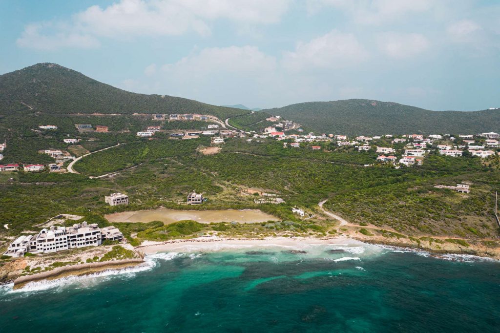 Aerial view of the island and the sea in Sint Maarten. Quading & getting ghosted by my hotel in Dominica