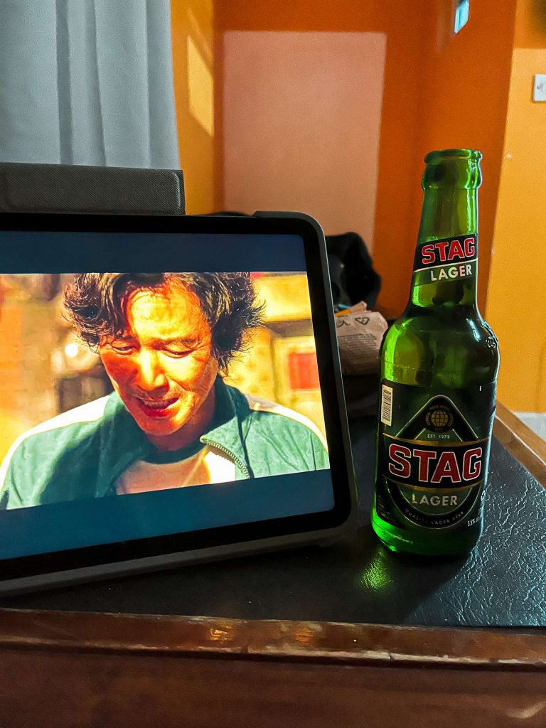 Bottle of Stag beer and ipad movie in Grenada. The most stressful travel day ever!