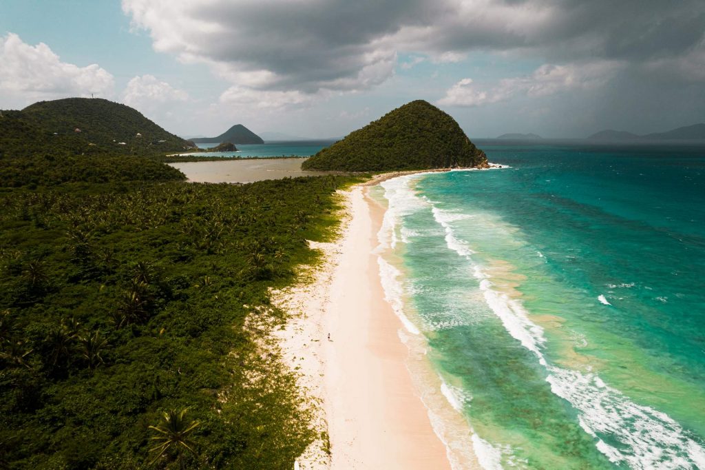 Aerial view of the sea, beach, sand and trees in British Virgin Islands. BVI has me