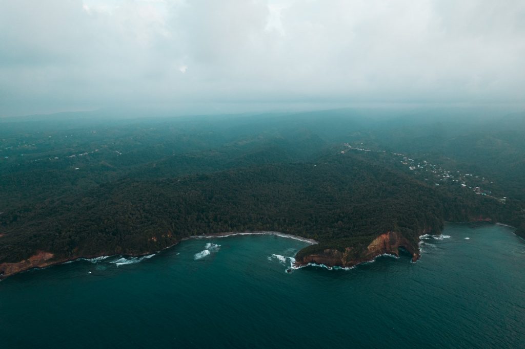 Aerial view of the island and the sea in Dominica. The start of a Covid nightmare