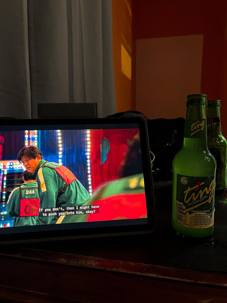 Bottle of Ting beer and ipad movie in Grenada. The most stressful travel day ever!