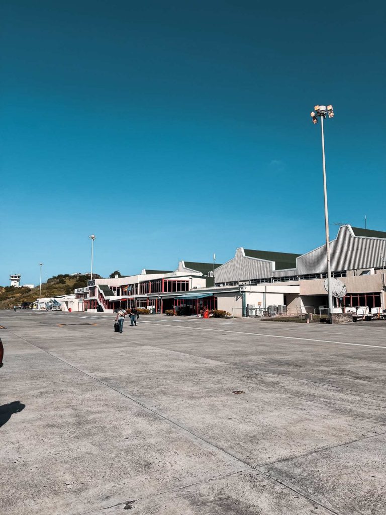 Sunny airport tarmac in Saint Vincent and the Grenadines. Quarantine detour!