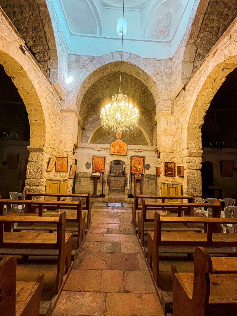 Inside church of Sergus Bachus in Mulula in Syria. Driving into Syria