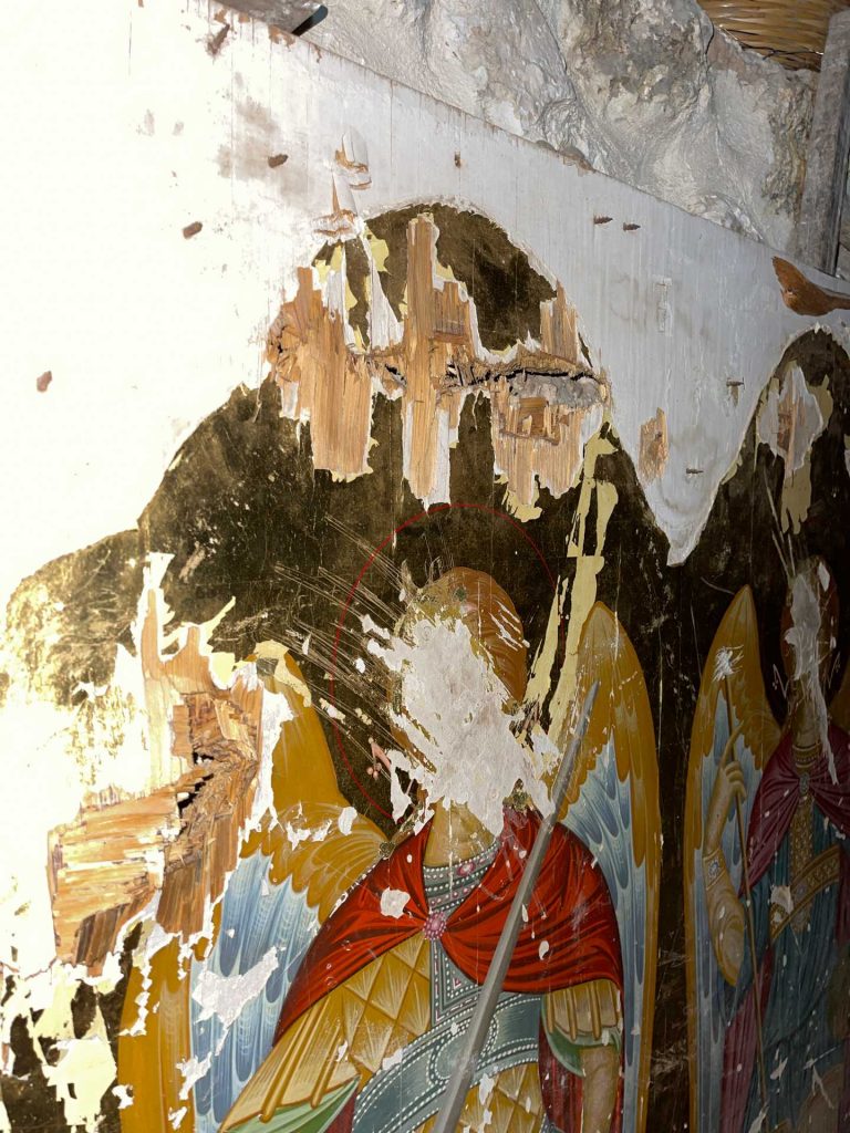 Vandalized religious murals of Church of Saint Takla in Syria. Driving into Syria