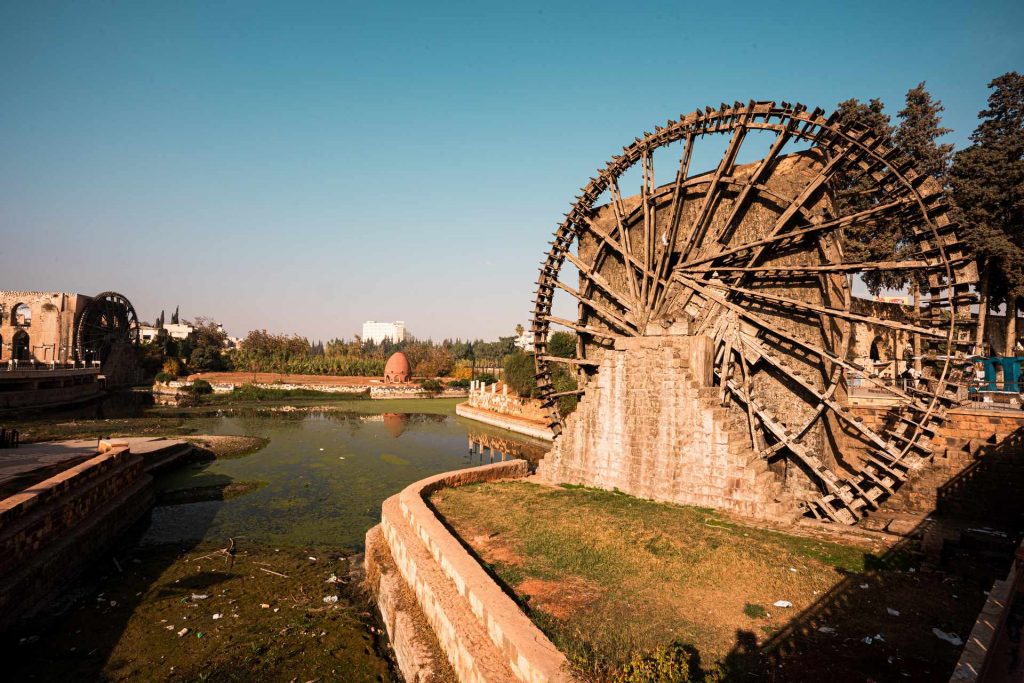 Water wheels by the river in Aleppo. A day in Hama, Syria