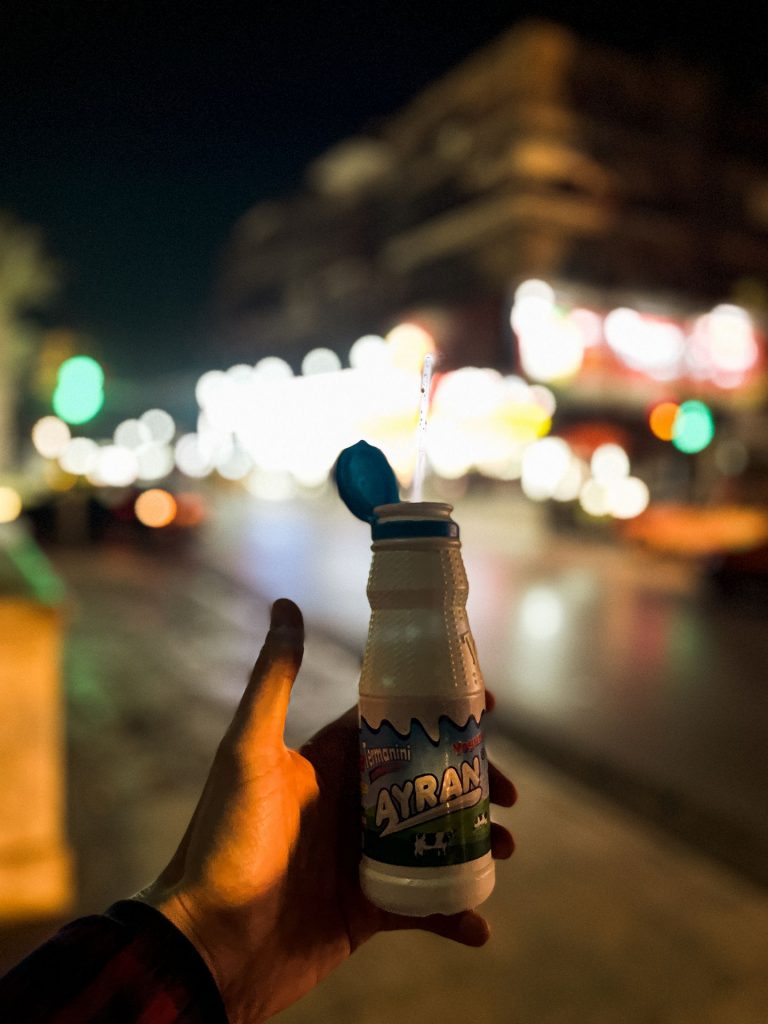 Bottle of milk by the street in Aleppo. A day in Aleppo and generosity of new friends