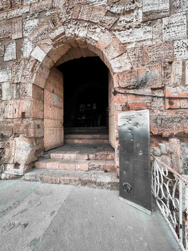 Entrance to Krak Des Chevaliers castle. Whats the krak in Syria