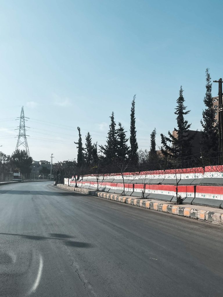 Empty highway surrounded by trees in Baalbek, Lebanon. The worst driver and Baalbek