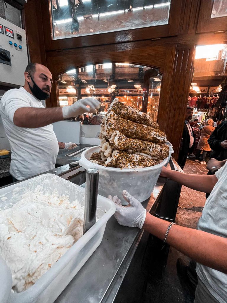 Ice cream vendor inside shop in Damascus, Syria. A day in Damascus