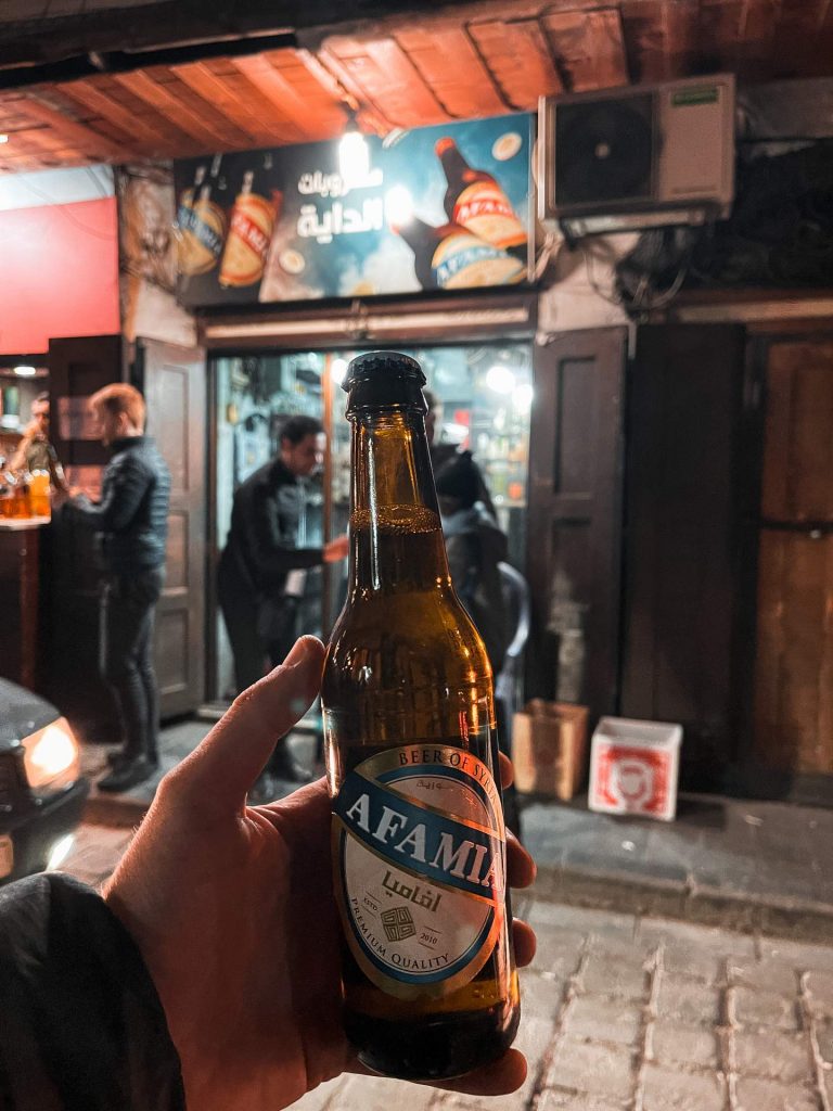 Afamia bottle of beer at night in Damascus, Syria. A day in Damascus