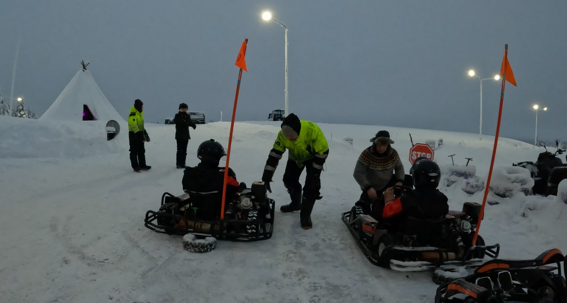Staff readying the ice karters in Saariselka, Finland. Frozen karting & husky rides
