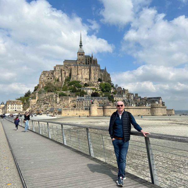 Dad in Mont Saint Michel Abbey in Normandy, France. The best steak & omelette in the world in the same day