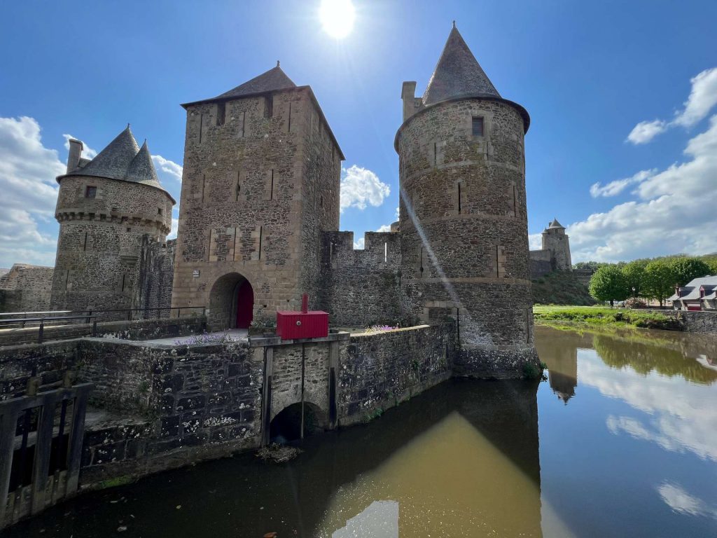 Castle by the moat in Fougeres, France. Is this the best island in the world?
