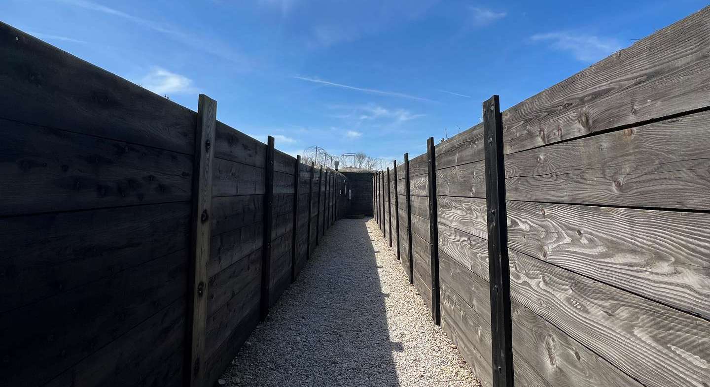 Trench lined with wood in Crisbecq Battery in Normandy, France. The best steak & omelette in the world in the same day