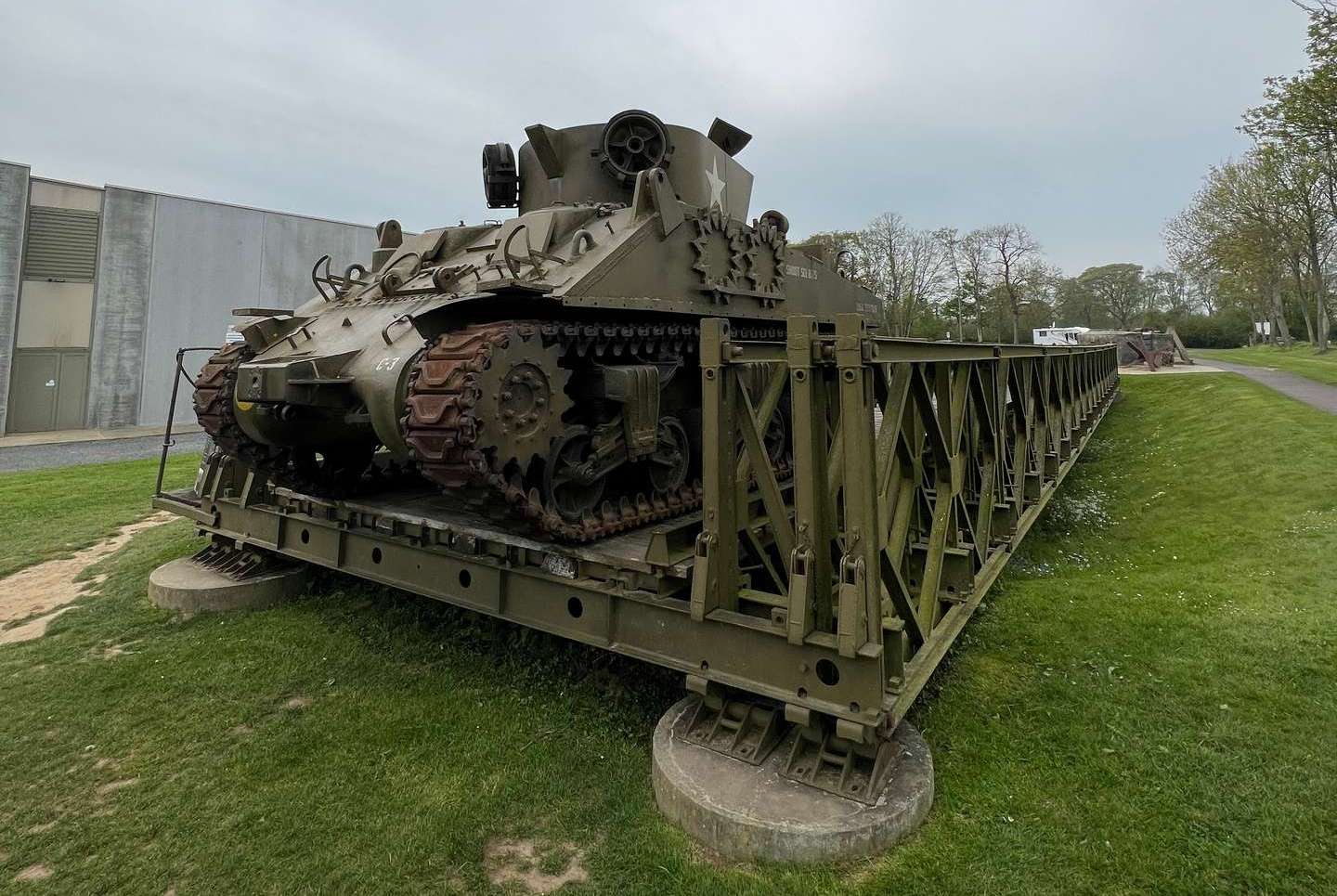 Tank exhibit outside Overlord Museum in Normandy, France. Is there any such thing as a good beach in Normandy?