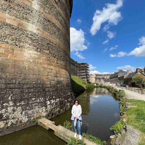 Mom standing by the castle moat in Fougeres, France. Is this the best island in the world?