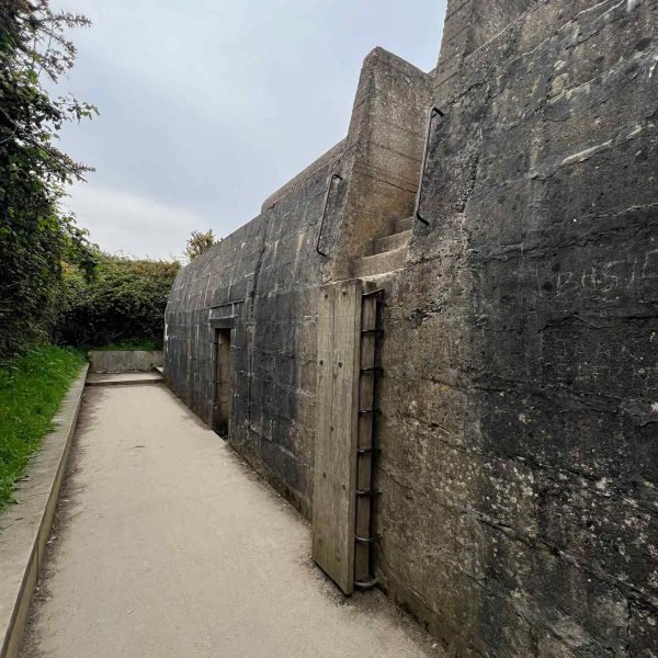 Concrete bunker in Longues Sur Mer Battery in Normandy, France. Is there any such thing as a good beach in Normandy?