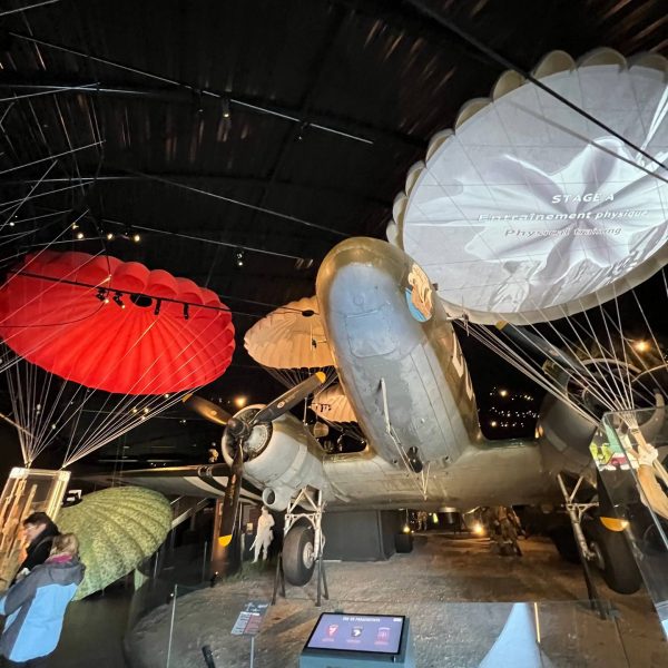 Planes and parachutes exhibit in Airborne Museum in Sainte Mere Eglise in Normandy, France. The best steak & omelette in the world in the same day