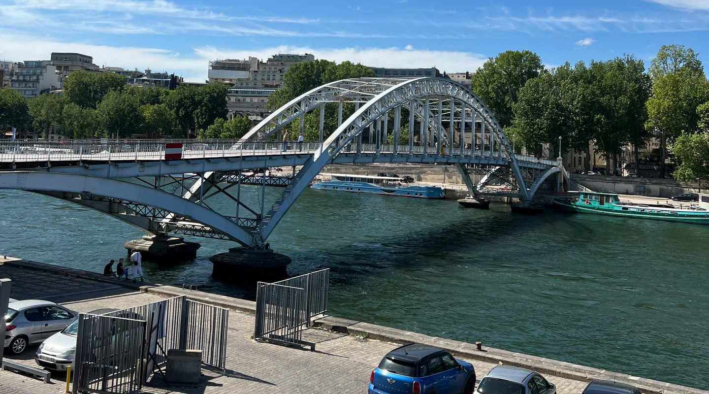 Bridge across river in Paris, France. Finishing up in Paris