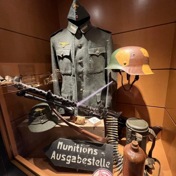 Military uniform and weapons exhibit in Baugnez 44, Belgium. The worst hotel owner in Europe