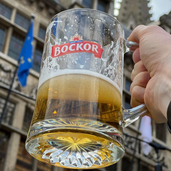 Mug of Bockor beer in a restaurant in Belgium. The worst hotel owner in Europe