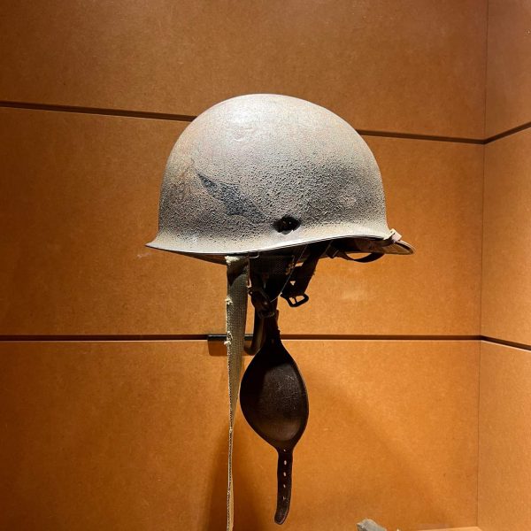 Military helmet exhibit in Baugnez 44, Belgium. The worst hotel owner in Europe