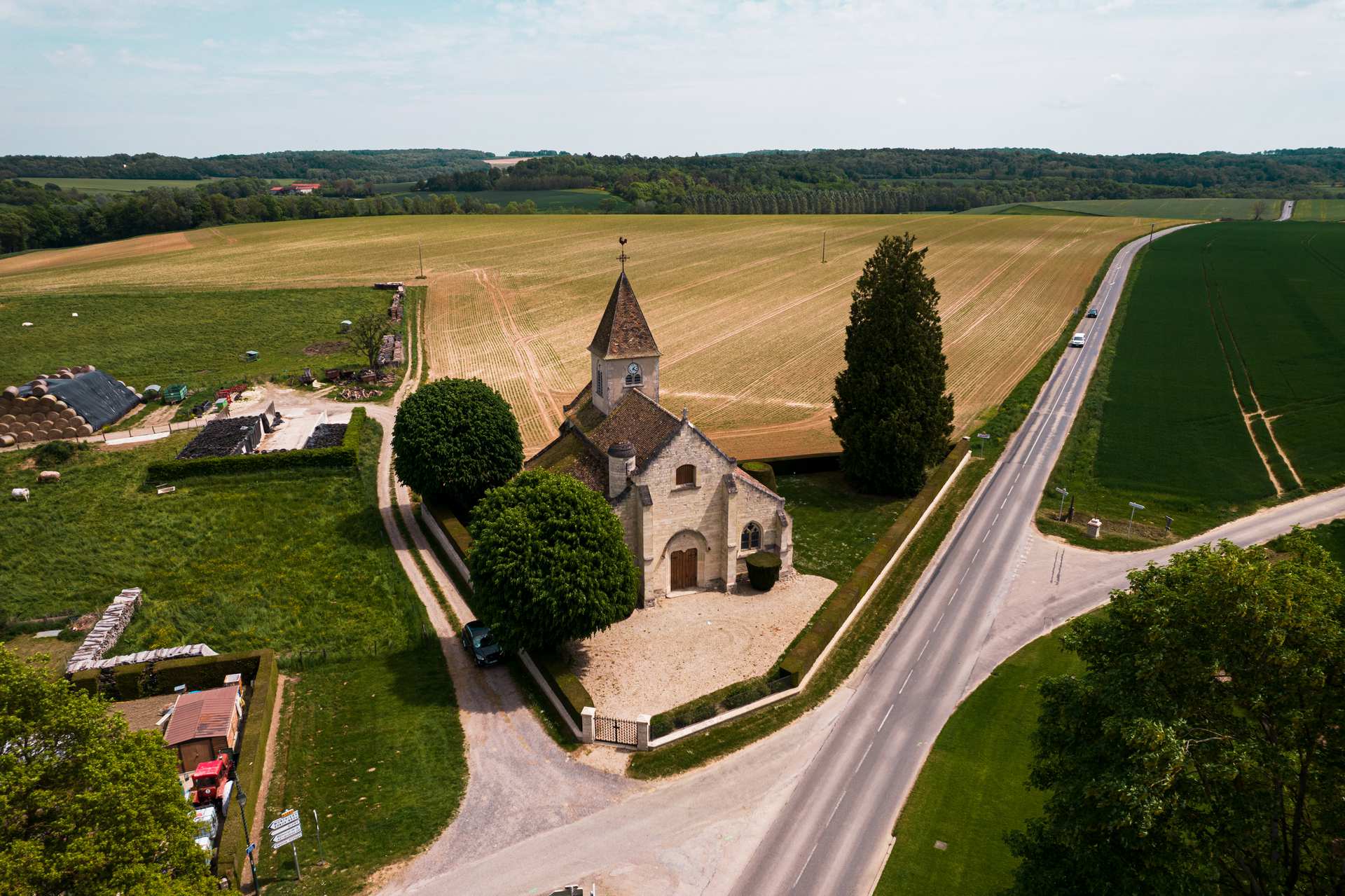 Aerial photo of chapel by the road in Normandy, France. Finishing up in Paris