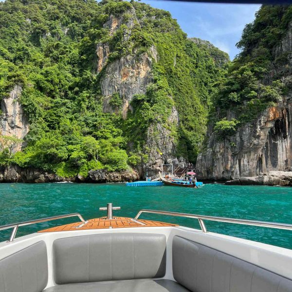 Boat approaching Maya Bay beach in Thailand. Boat ride from hell, island hopping from heaven