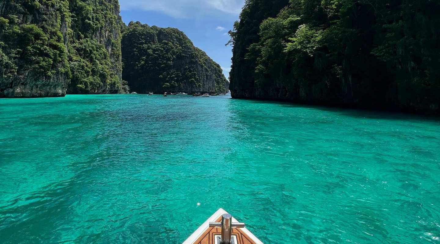 Boat at Pileh Bay in Thailand. Boat ride from hell, island hopping from heaven