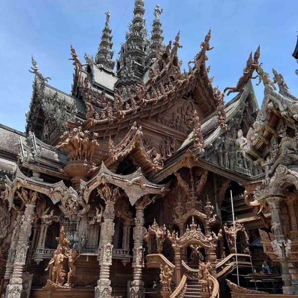 Exterior of Sanctuary of Truth in Pattaya, Thailand. A Mcdonalds feast and the Sanctuary of Truth
