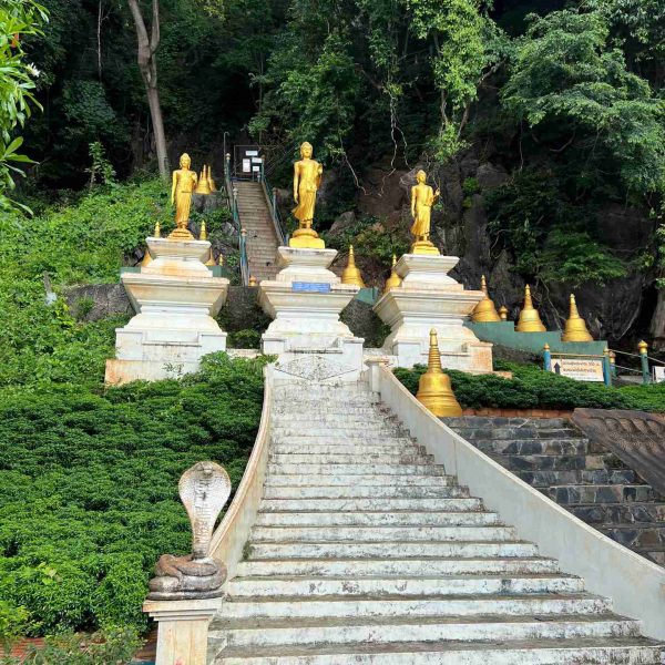 Statues and stairs in Tiger Temple, Thailand. Railay Viewpoint, Tiger Temple & the best Tom Yum in Thailand
