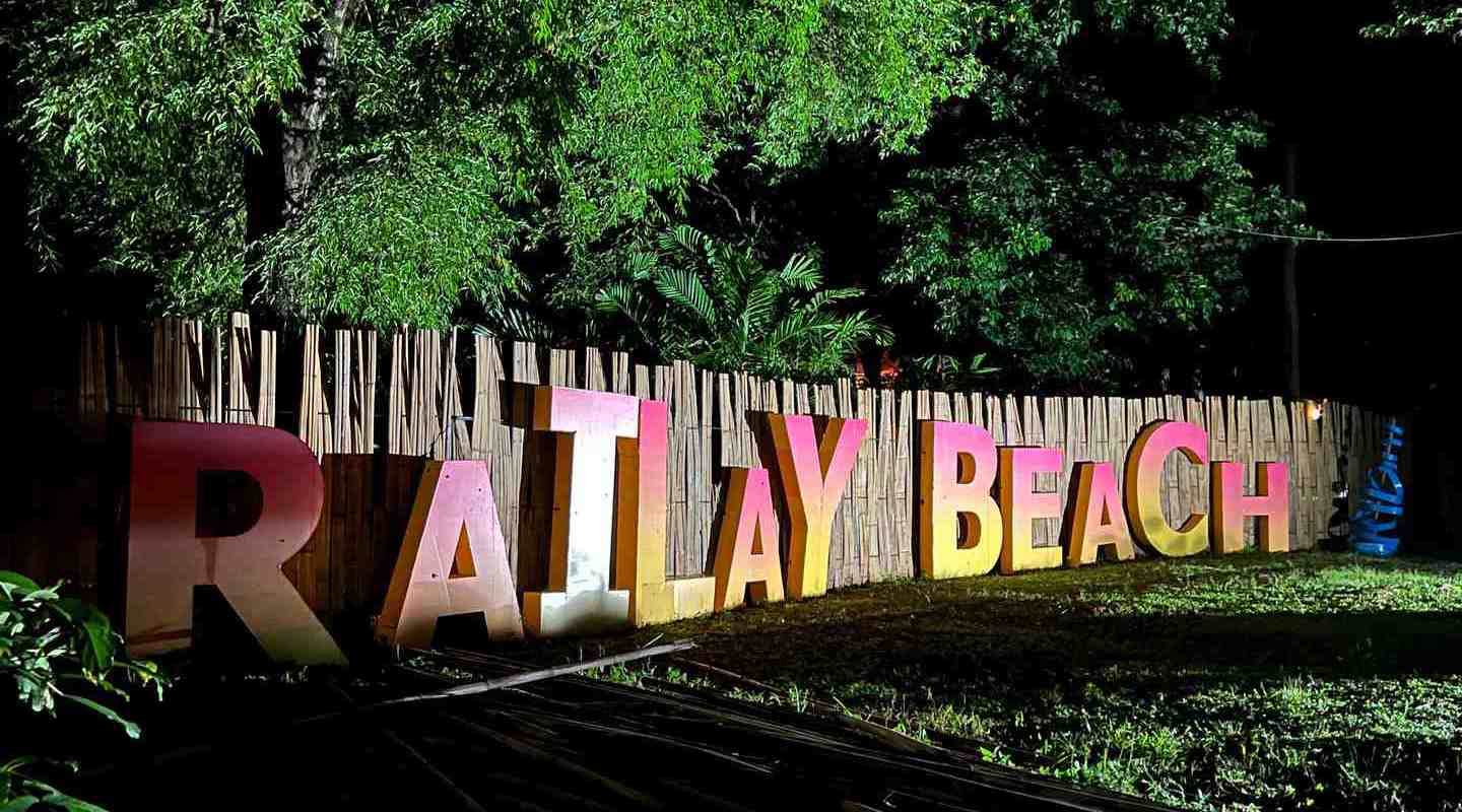 Railay Beach sign at night in Railay Beach, Thailand. Rock climbing on Railay Beach