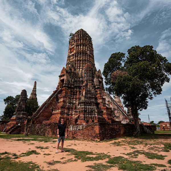 David Simpson standing by a temple in Ayutthaya, Thailand. Ayutthaya, food frenzy & cryo time