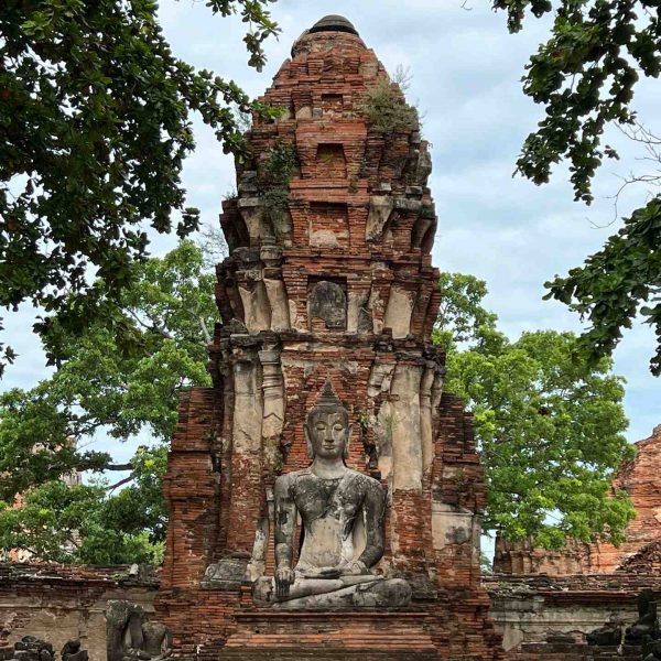 Seated Buddha statue and temple in Ayutthaya, Thailand. Ayutthaya, food frenzy & cryo time
