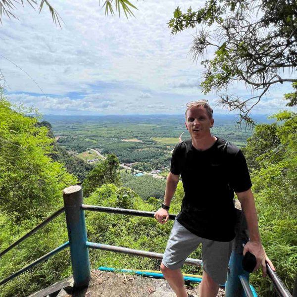 David Simpson at stairs in Tiger Temple, Thailand. Railay Viewpoint, Tiger Temple & the best Tom Yum in Thailand
