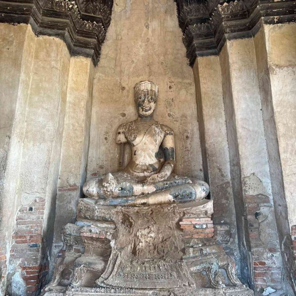 Seated Buddha statue in Ayutthaya, Thailand. Ayutthaya, food frenzy & cryo time