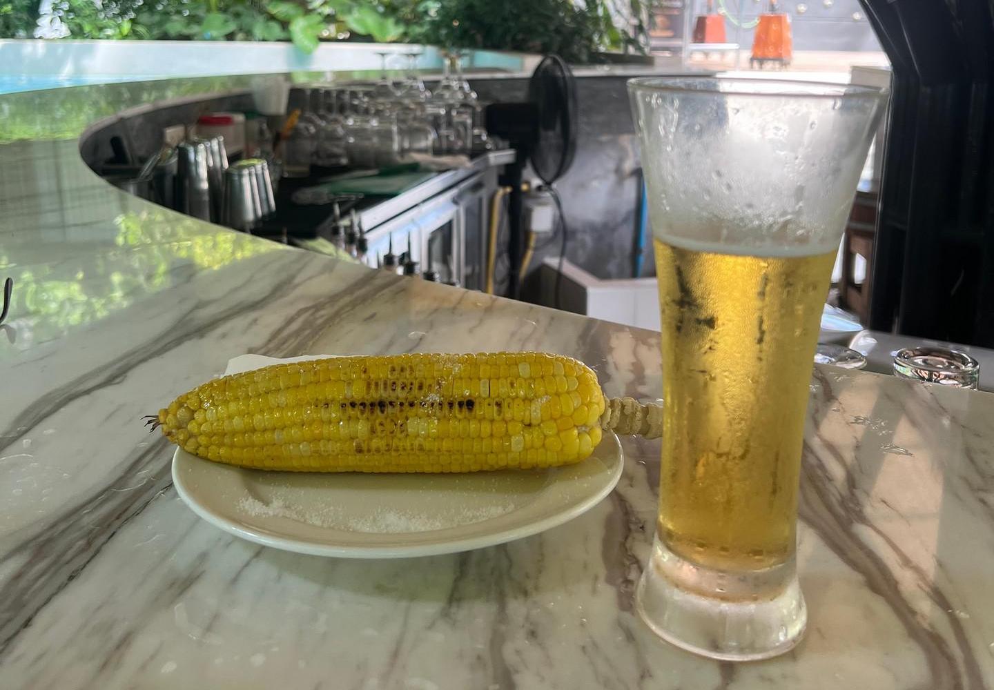 Roasted corn and glass of beer at Panan Resort in Krabi, Thailand. Railay Viewpoint, Tiger Temple & the best Tom Yum in Thailand