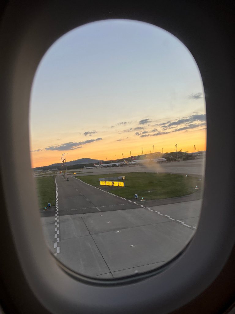 Plane window view of Tarmac of Thailand airport. The day to end all days in Bangkok