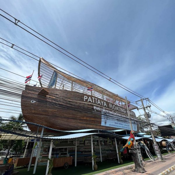 Wooden ship at Floating Market in Pattaya, Thailand. Buddha Mountain, floating market, Golden Buddha, ear spa & an Imperial Massage