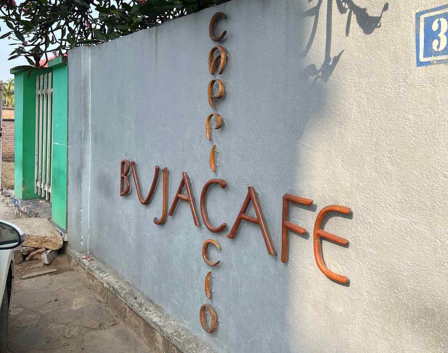 Bujacafe wall sign in Bujumbura, Burundi. Checking out Bujumbura