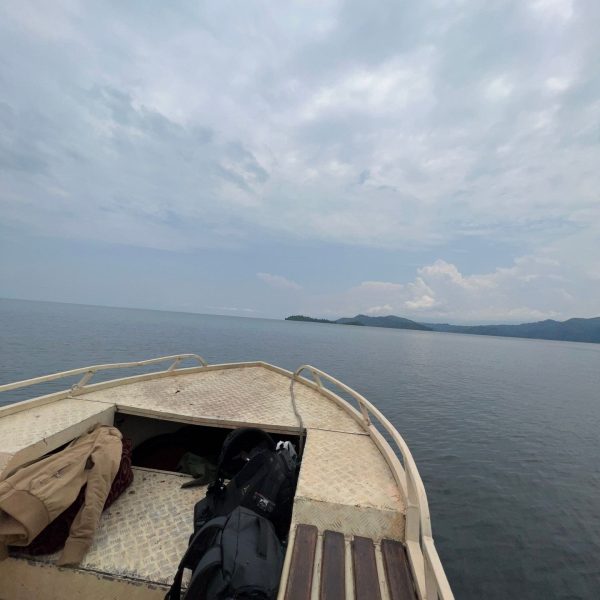 Boat on the sea near Tchegera Island, DRC. Checkpoint trouble and Tchegera Island all alone