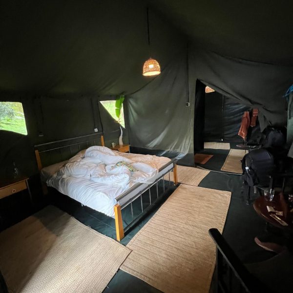 Bedroom at tent accommodations in Tchegera Island, DRC. Checkpoint trouble and Tchegera Island all alone